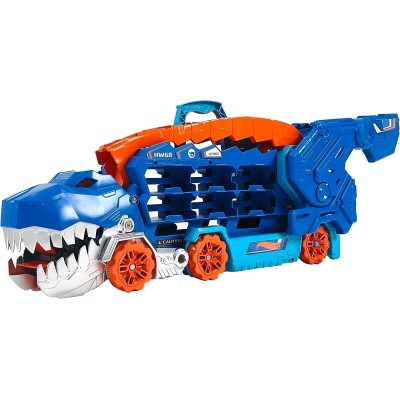 Mattel HNG50 ​Hot Wheels City Mega Dino Trasportatore pista da corsa che si trasforma in un T-Rex autotrasportatore